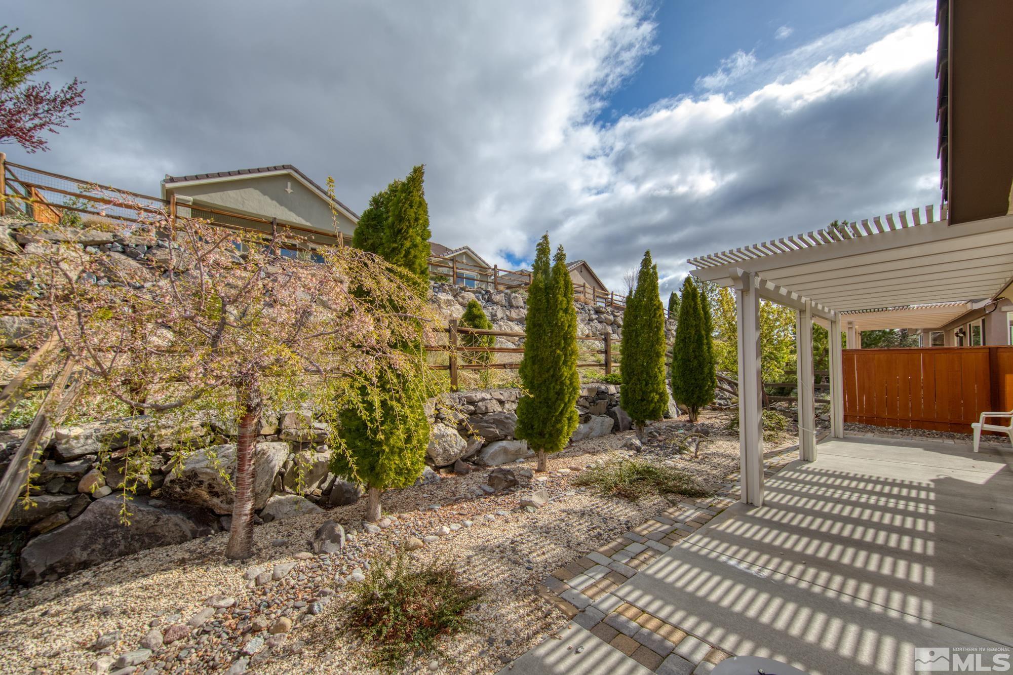 1180 Meridian Ranch Drive Reno, NV 89523 - Photo 26 of 28 a view of a pathway with a yard