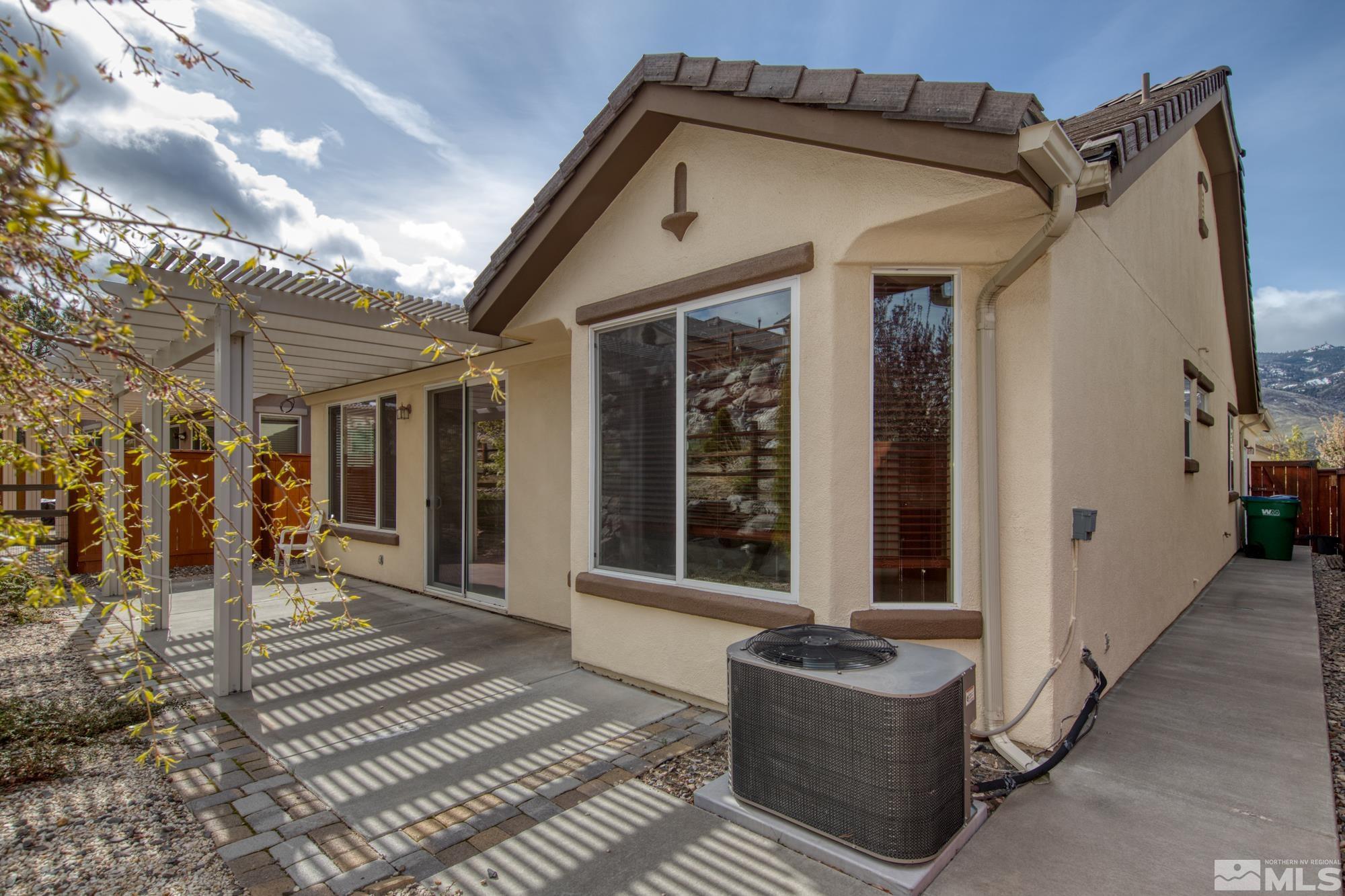 1180 Meridian Ranch Drive Reno, NV 89523 - Photo 27 of 28 a front view of a house with a porch