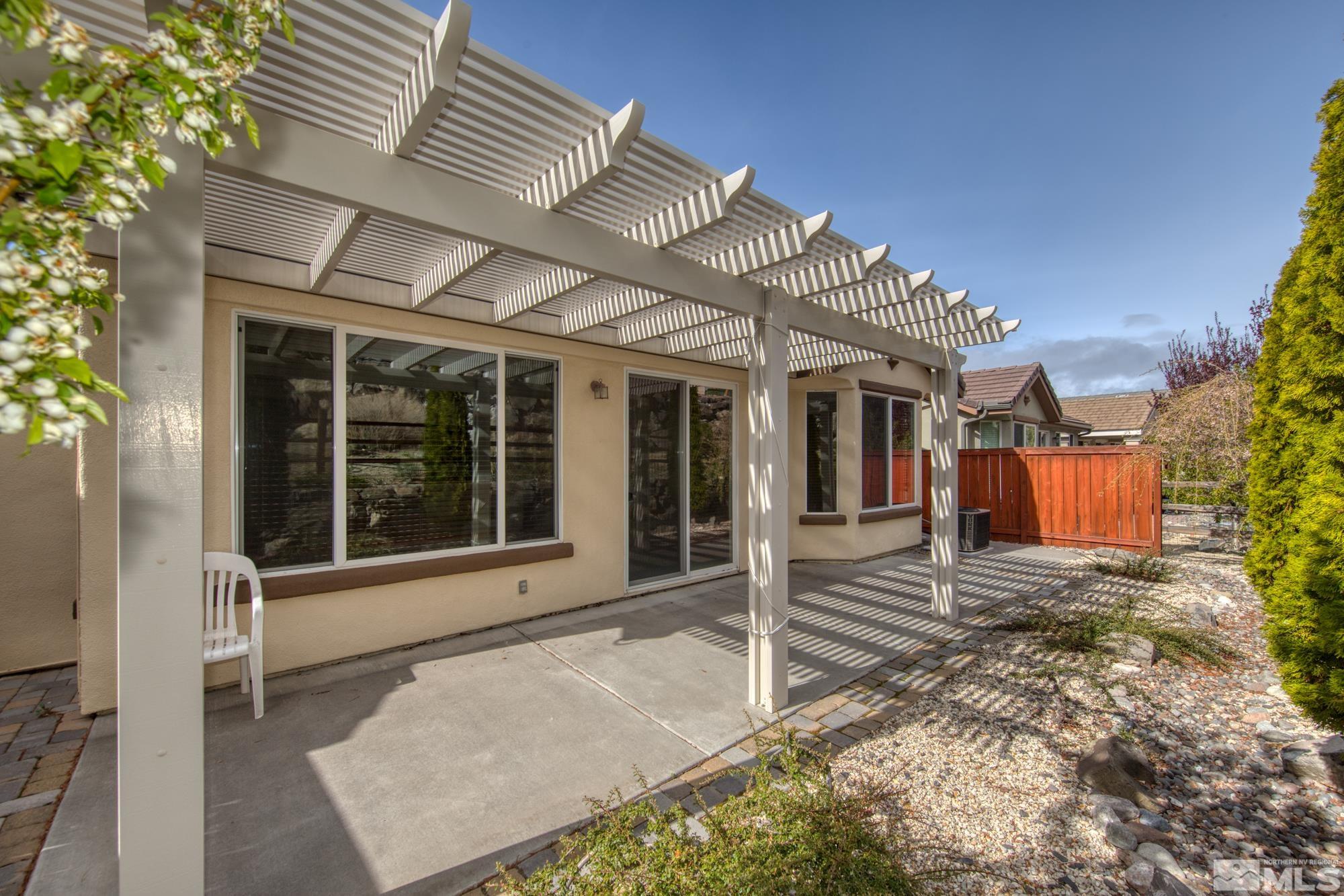 1180 Meridian Ranch Drive Reno, NV 89523 - Photo 28 of 28 a front view of a house with a porch