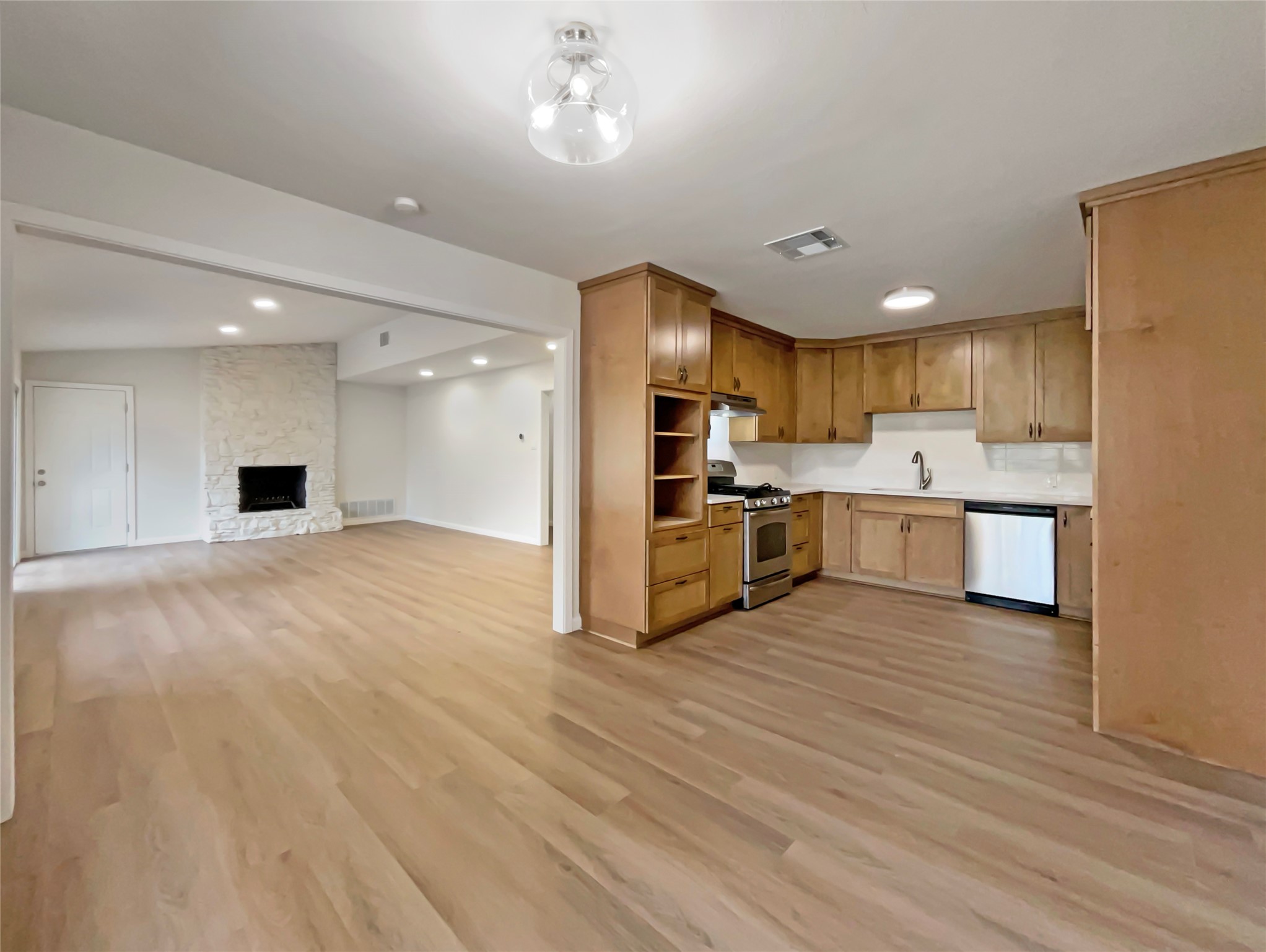 6805 Crystalbrook Drive Austin, TX 78724 - Photo 11 of 31 a view of kitchen with wooden floor