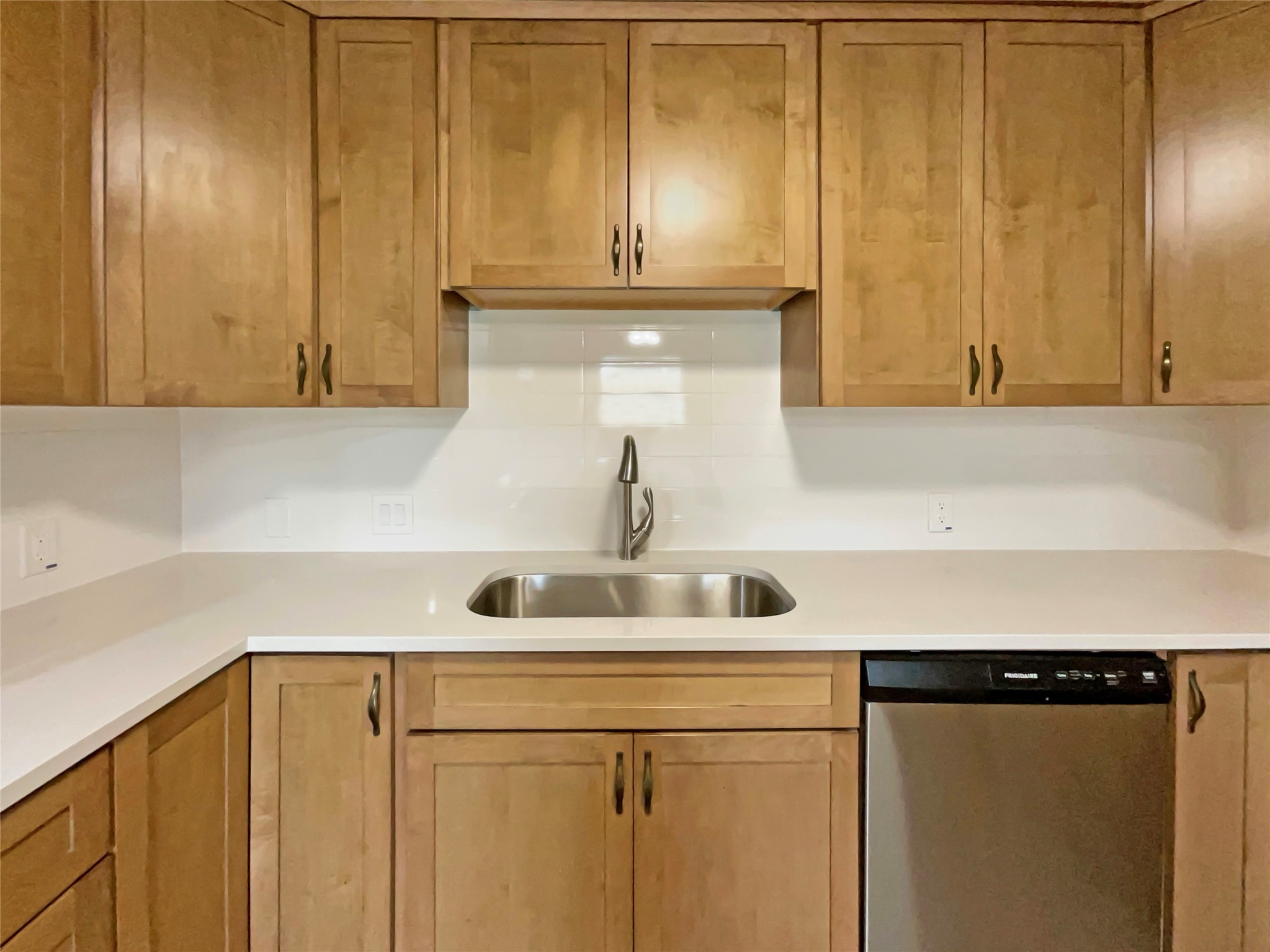 6805 Crystalbrook Drive Austin, TX 78724 - Photo 13 of 31 a kitchen with a sink and a mirror