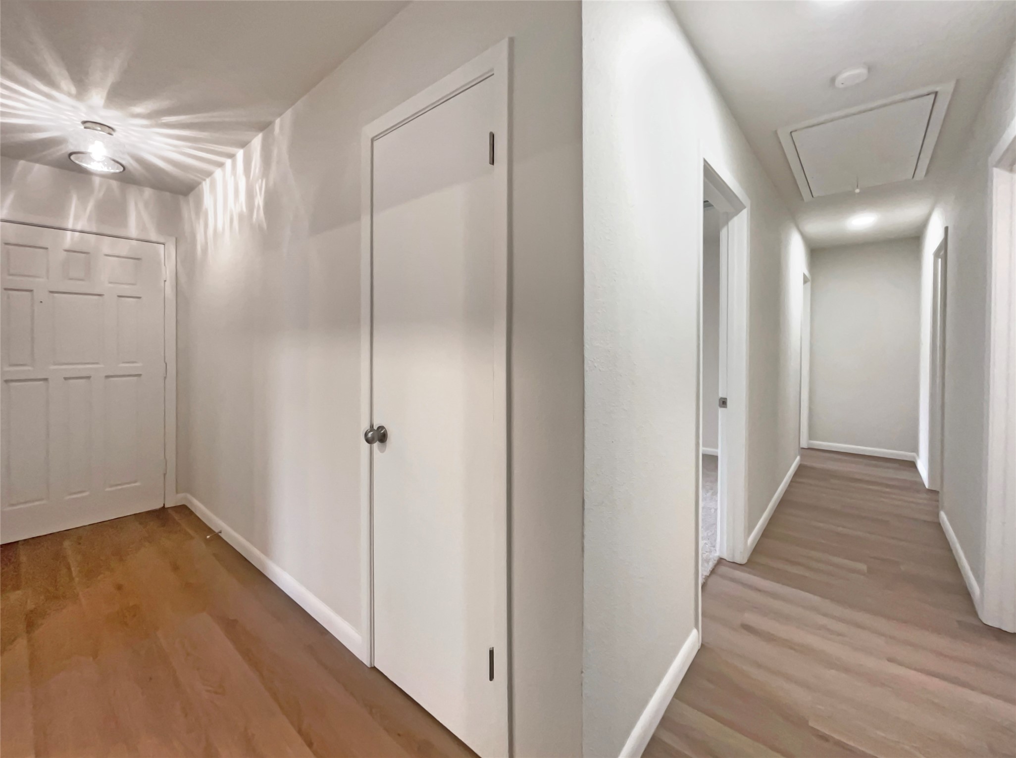 6805 Crystalbrook Drive Austin, TX 78724 - Photo 17 of 31 a view of a hallway with wooden floor