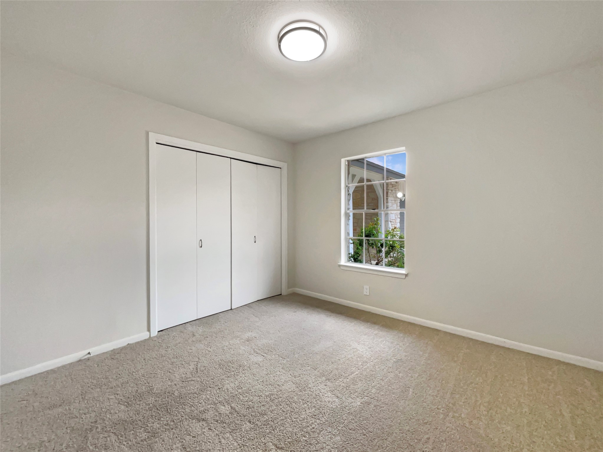 6805 Crystalbrook Drive Austin, TX 78724 - Photo 21 of 31 an empty room with windows and view