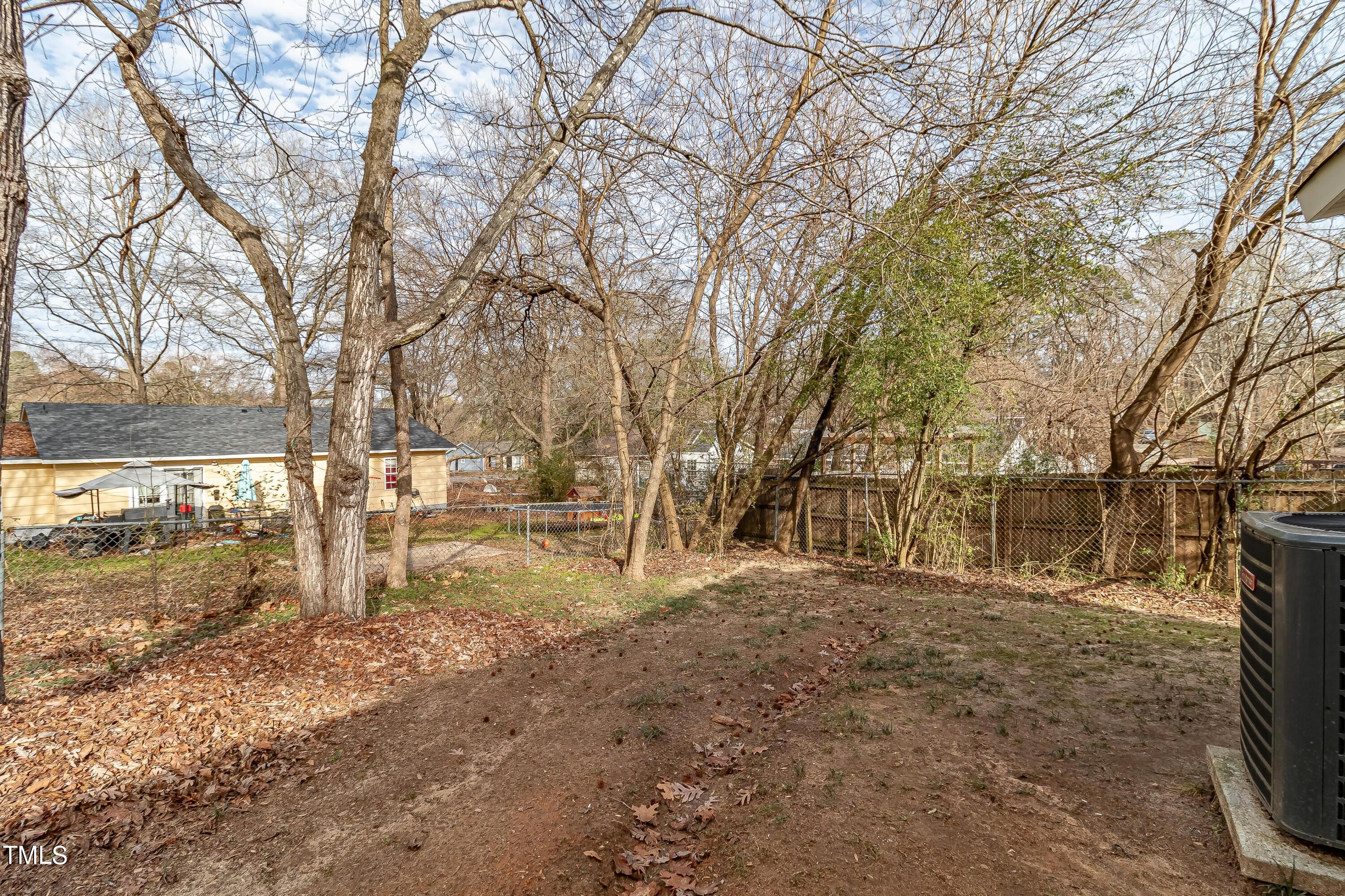1205 Armstrong Circle Raleigh, NC 27610 - Photo 24 of 31 a view of a yard with a tree