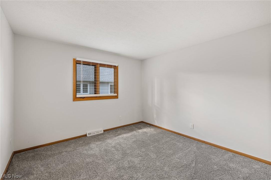 14495 Sheldon Road Cleveland, OH 44130 - Photo 19 of 27 Empty room with carpet