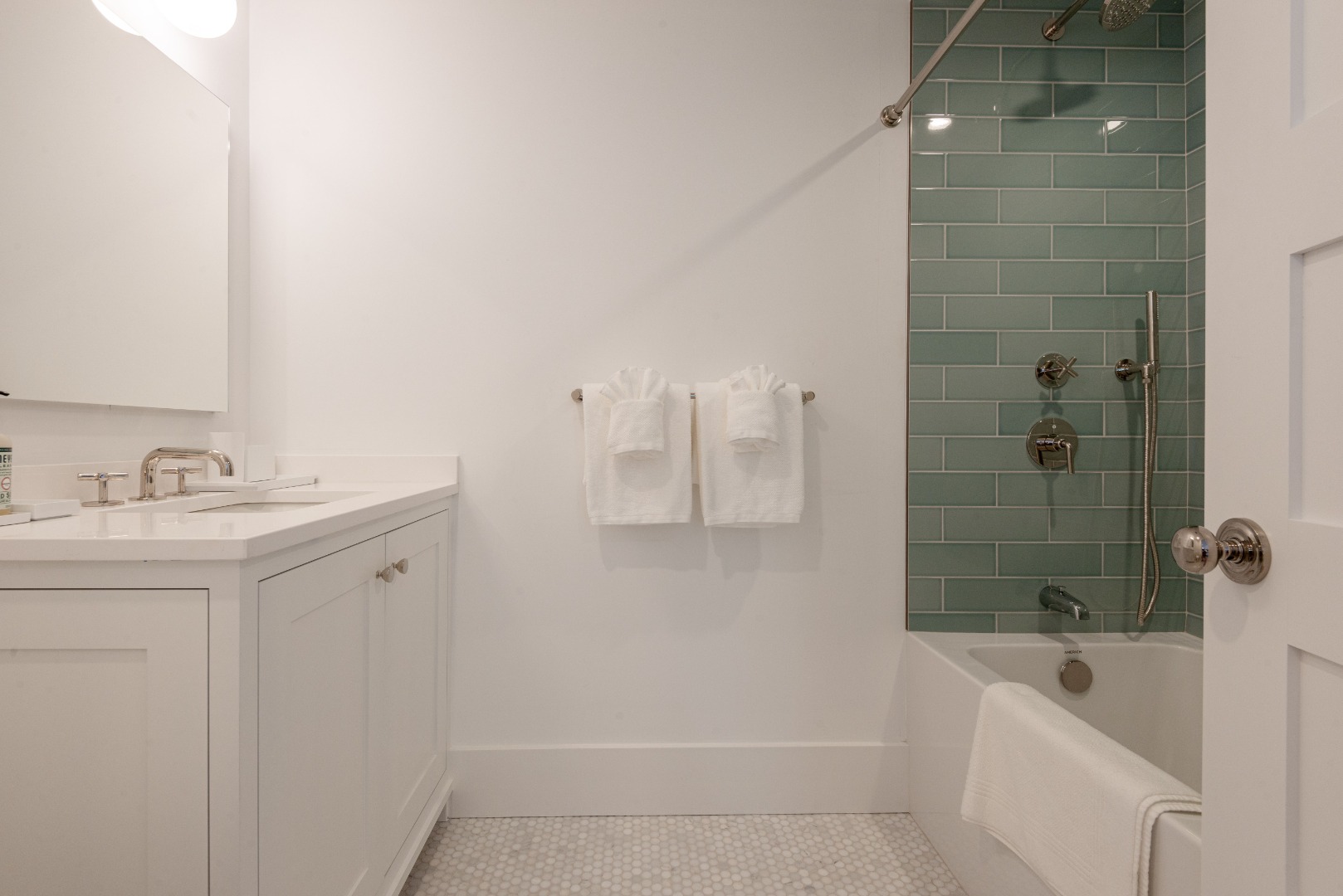 12 Willard Street Nantucket, MA 02554 - Photo 25 of 36 a bathroom with a tub a sink a vanity and a shower