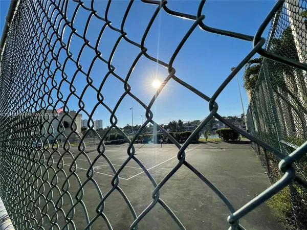 a view of a street with cars