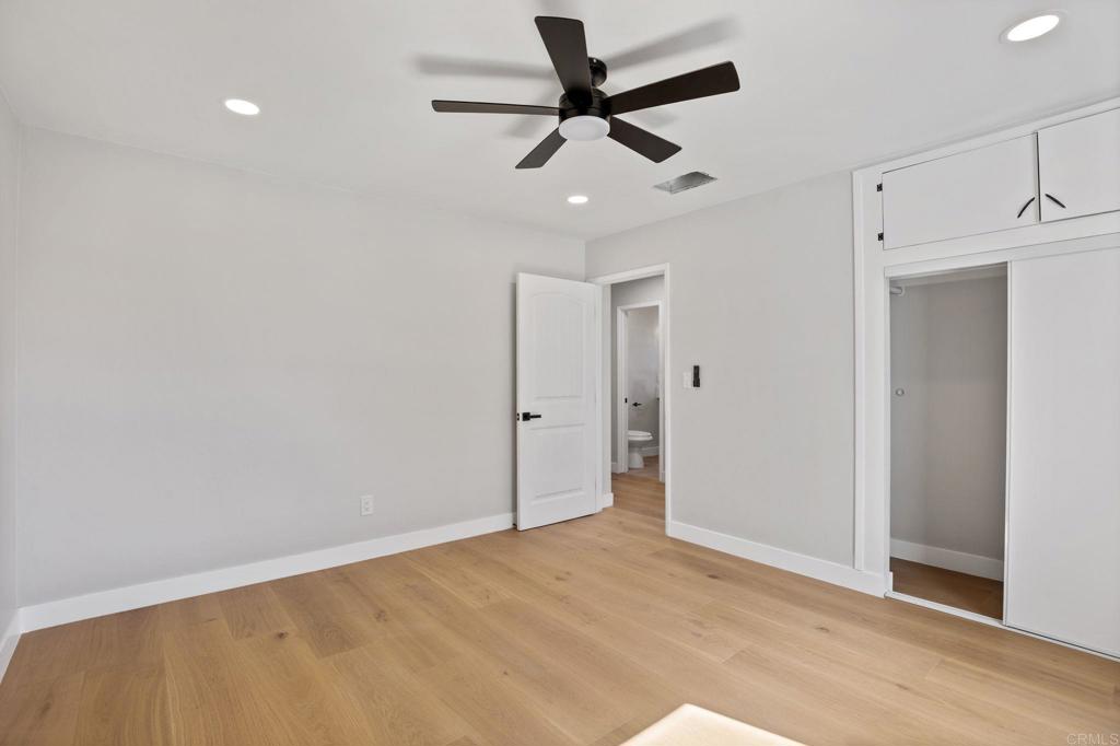 611 9th Street Ramona, CA 92065 - Photo 14 of 39 a view of a livingroom with a ceiling fan & kitchen floor
