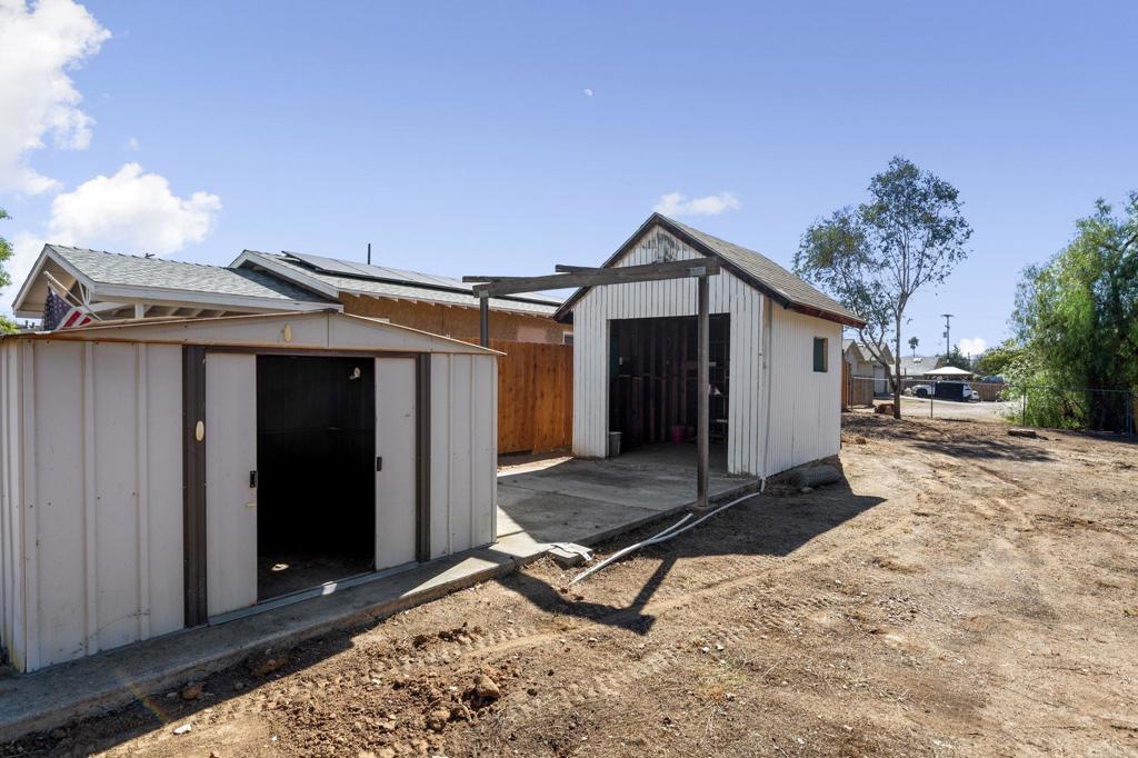 611 9th Street Ramona, CA 92065 - Photo 36 of 39 a house with trees in front of it