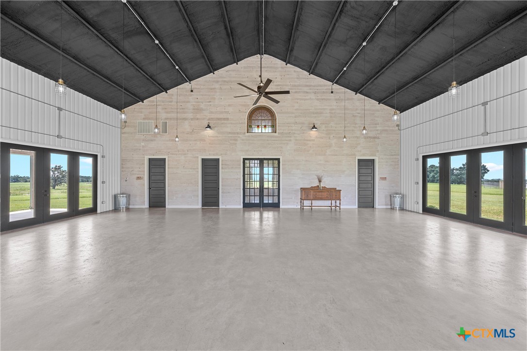 1006 County Road 280 Cameron, TX 76520 - Photo 21 of 48 a view of empty room with wooden floor and fan