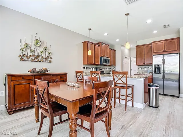 a view of a dining room with furniture