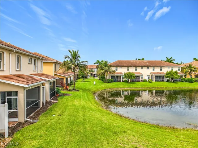 an aerial view of a house with big yard