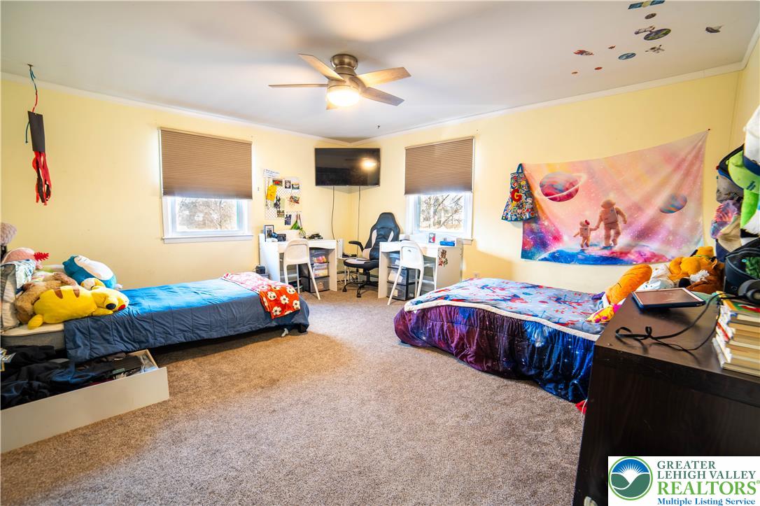 3360 Woodlea Road Orefield, PA 18069 - Photo 12 of 28 a bedroom with bed and window