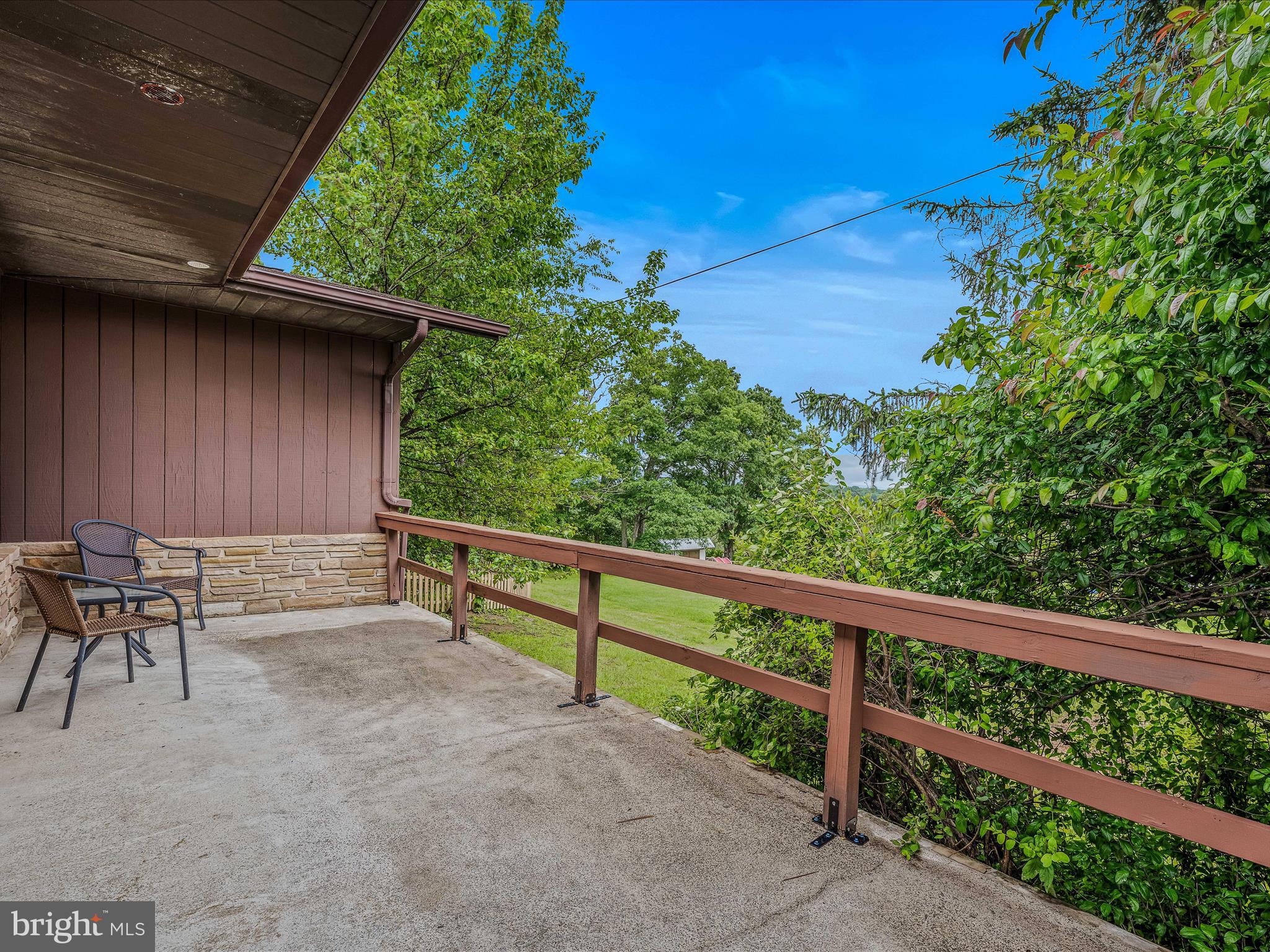 1103 Waugh Road Berkeley Springs, WV 25411 - Photo 35 of 63 Primary Bedroom Patio