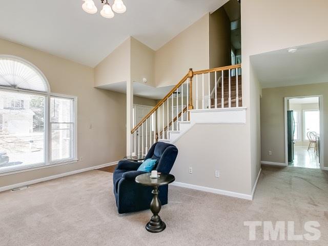 5709 Edgebury Road Raleigh, NC 27613 - Photo 6 of 20 a living room with furniture and a window