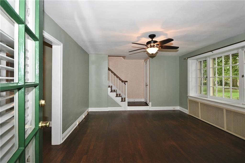 452 Sulgrave Road Pittsburgh, PA 15211 - Photo 4 of 25 a view of an empty room with a window