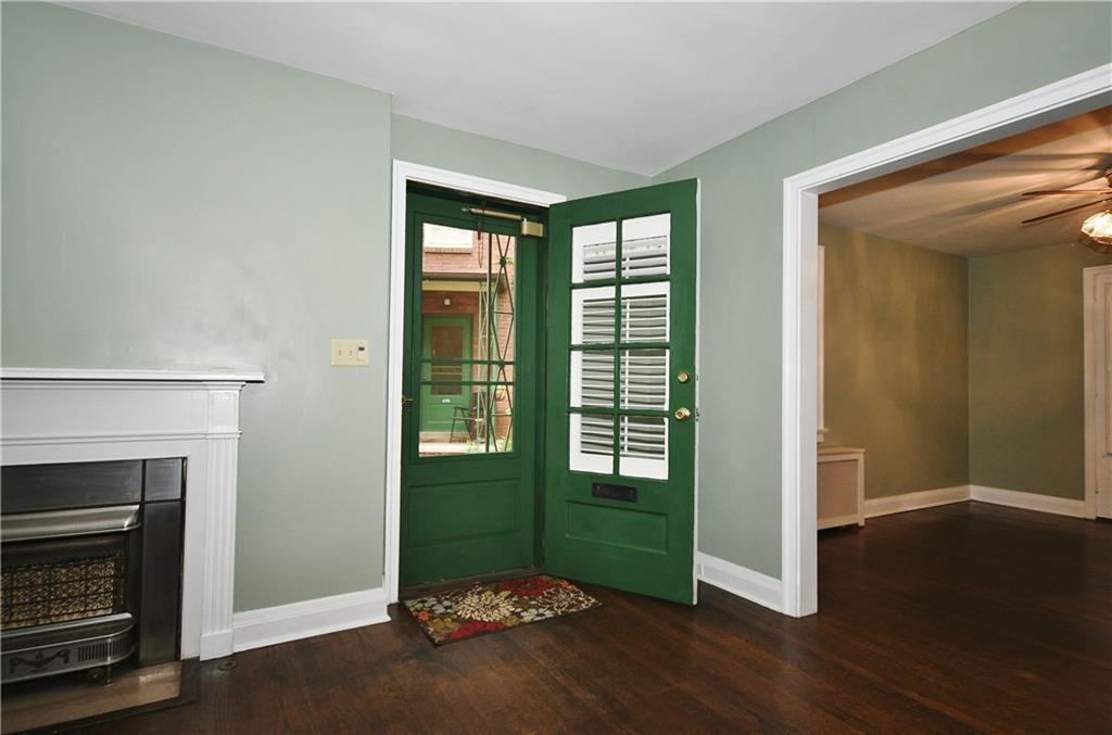 452 Sulgrave Road Pittsburgh, PA 15211 - Photo 6 of 25 a view of livingroom with furniture wooden floor and window