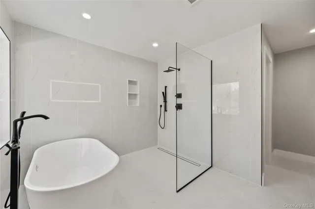 a bathroom with a sink and shower