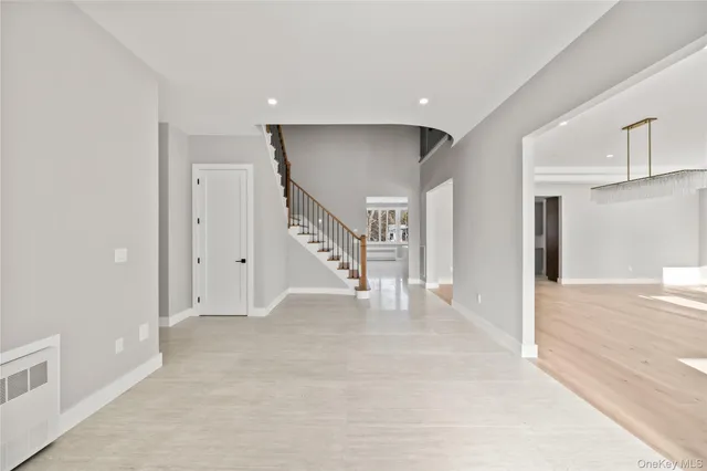 a view of an entryway with stairs