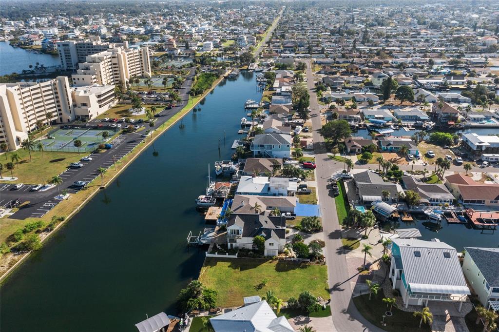 5889 Beverly Drive Hudson, FL 34667 - Photo 11 of 16 an aerial view of residential houses with outdoor space