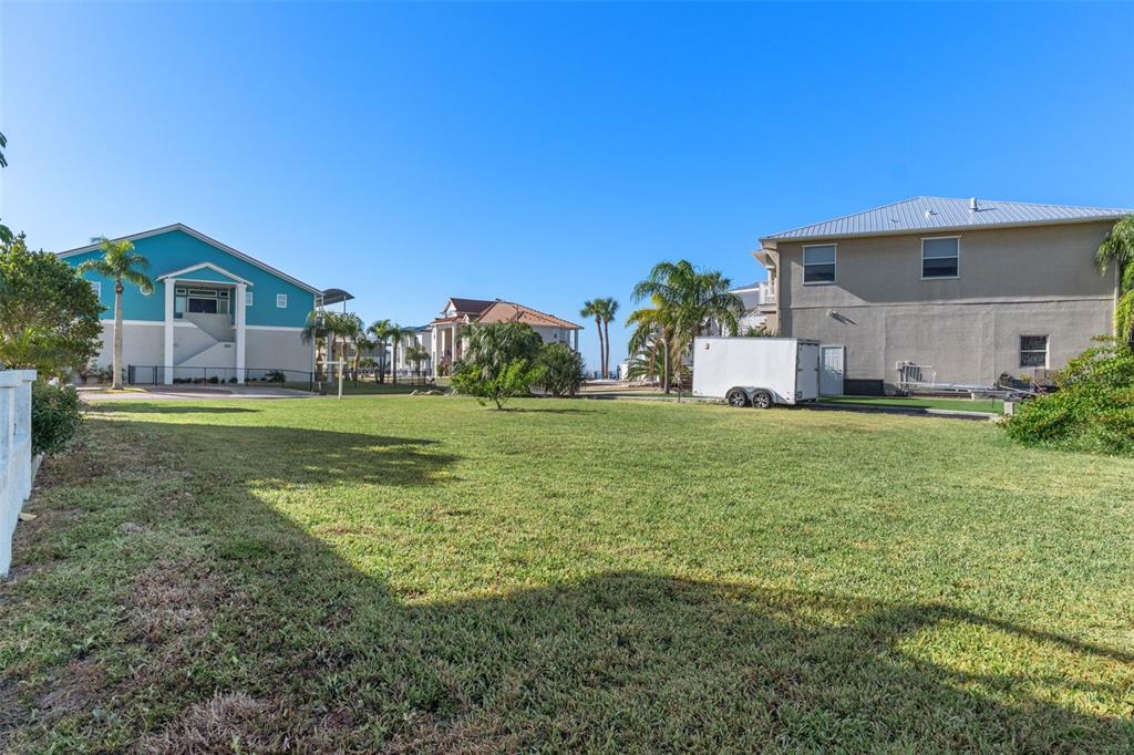 5889 Beverly Drive Hudson, FL 34667 - Photo 15 of 16 a view of a house with a yard