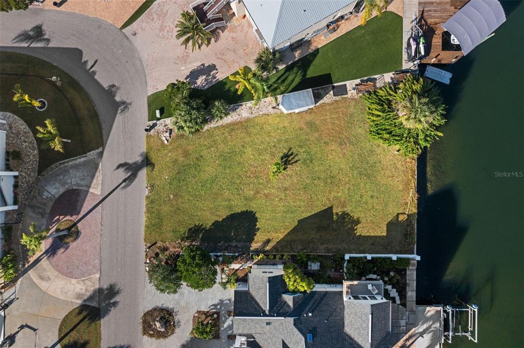 5889 Beverly Drive Hudson, FL 34667 - Photo 4 of 16 an aerial view of a house with a yard