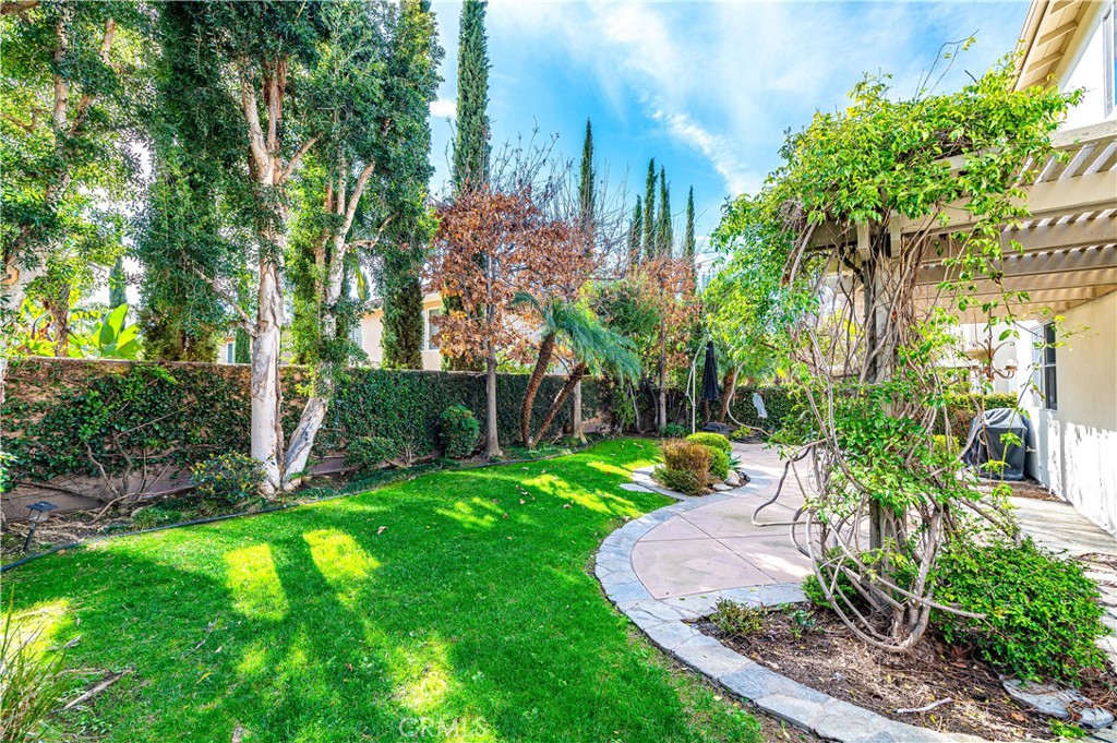 4 Whispering Pine Irvine, CA 92620 - Photo 10 of 13 a view of a yard with palm trees