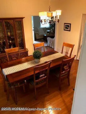 a kitchen with a sink dishwasher and cabinets