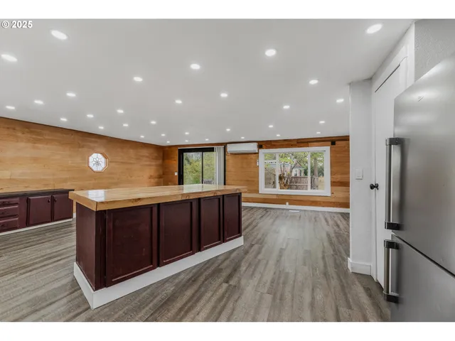 a kitchen with wooden floors