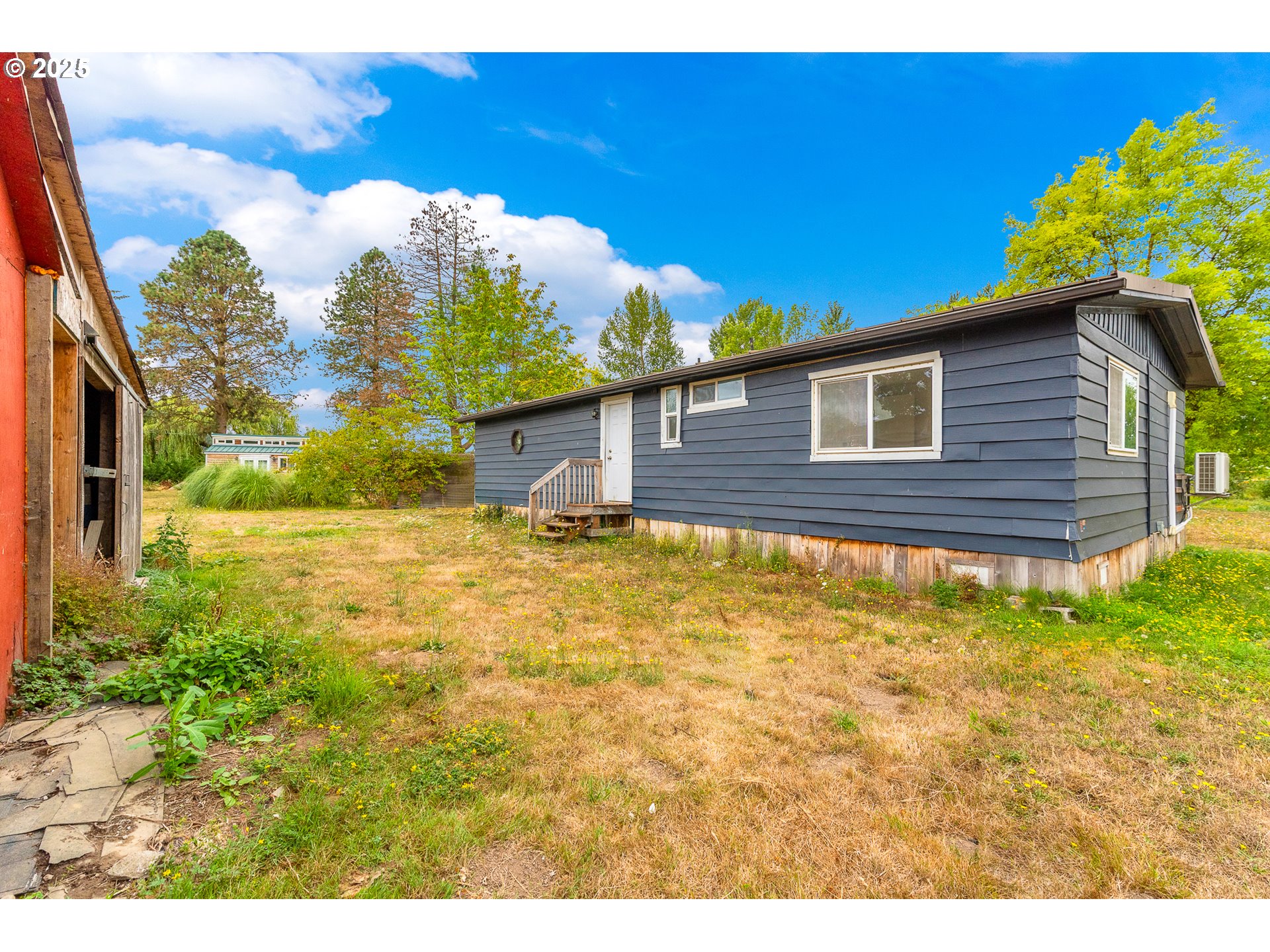 21617 Northeast 15th Avenue Ridgefield, WA 98642 - Photo 4 of 33 a house view with a backyard space