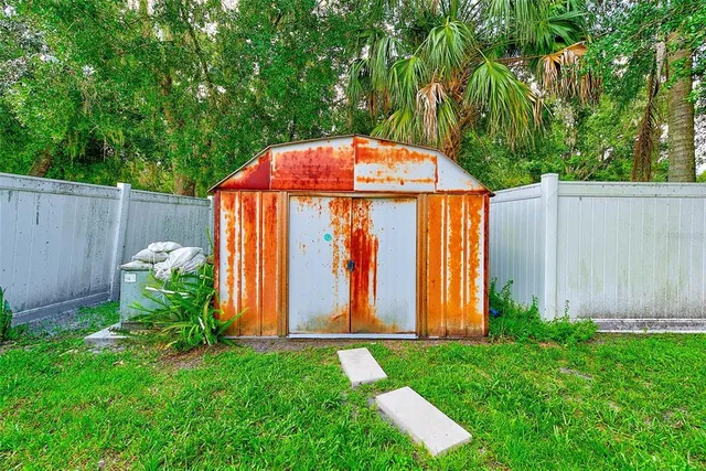 a view of a backyard with plants