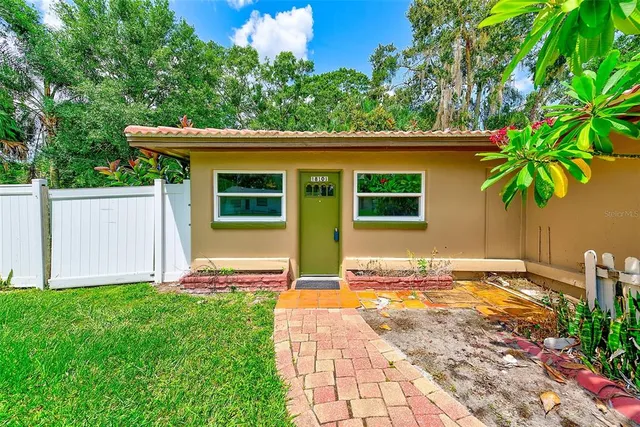 a view of a backyard with a garden