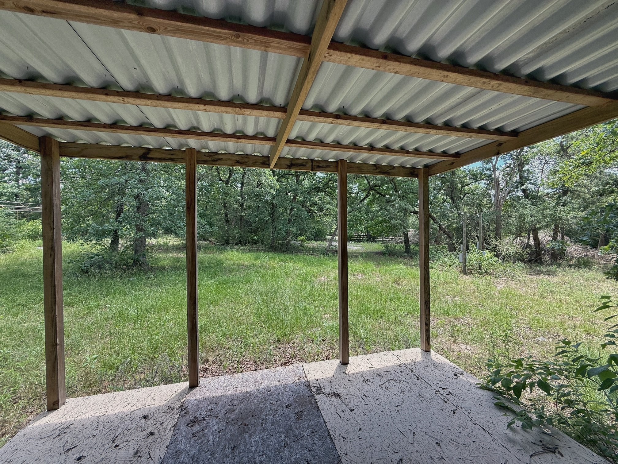 1491 County Road 1464 Centerville, TX 75833 - Photo 12 of 19 a view of a backyard of a house
