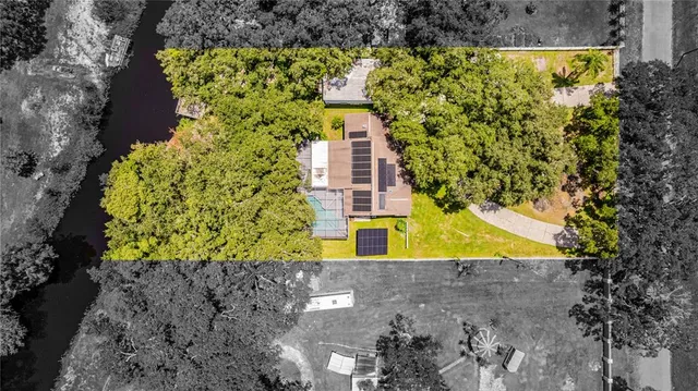 a view of a street with a yard