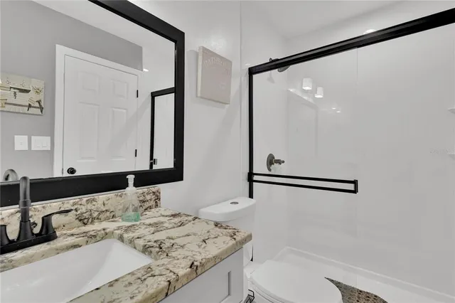 a view of an house with a backyard