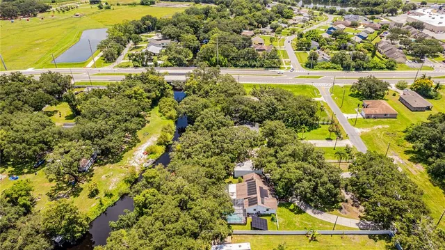 a view of a park with swings and slides