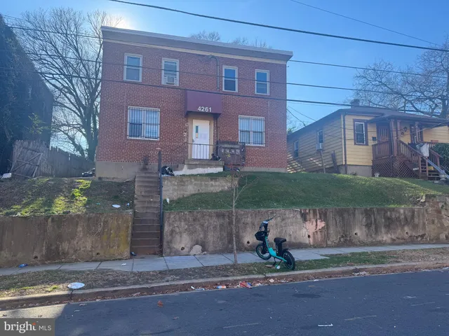 a outdoor view of a building with garage