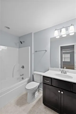 a view of a porch with a couches and table and chairs