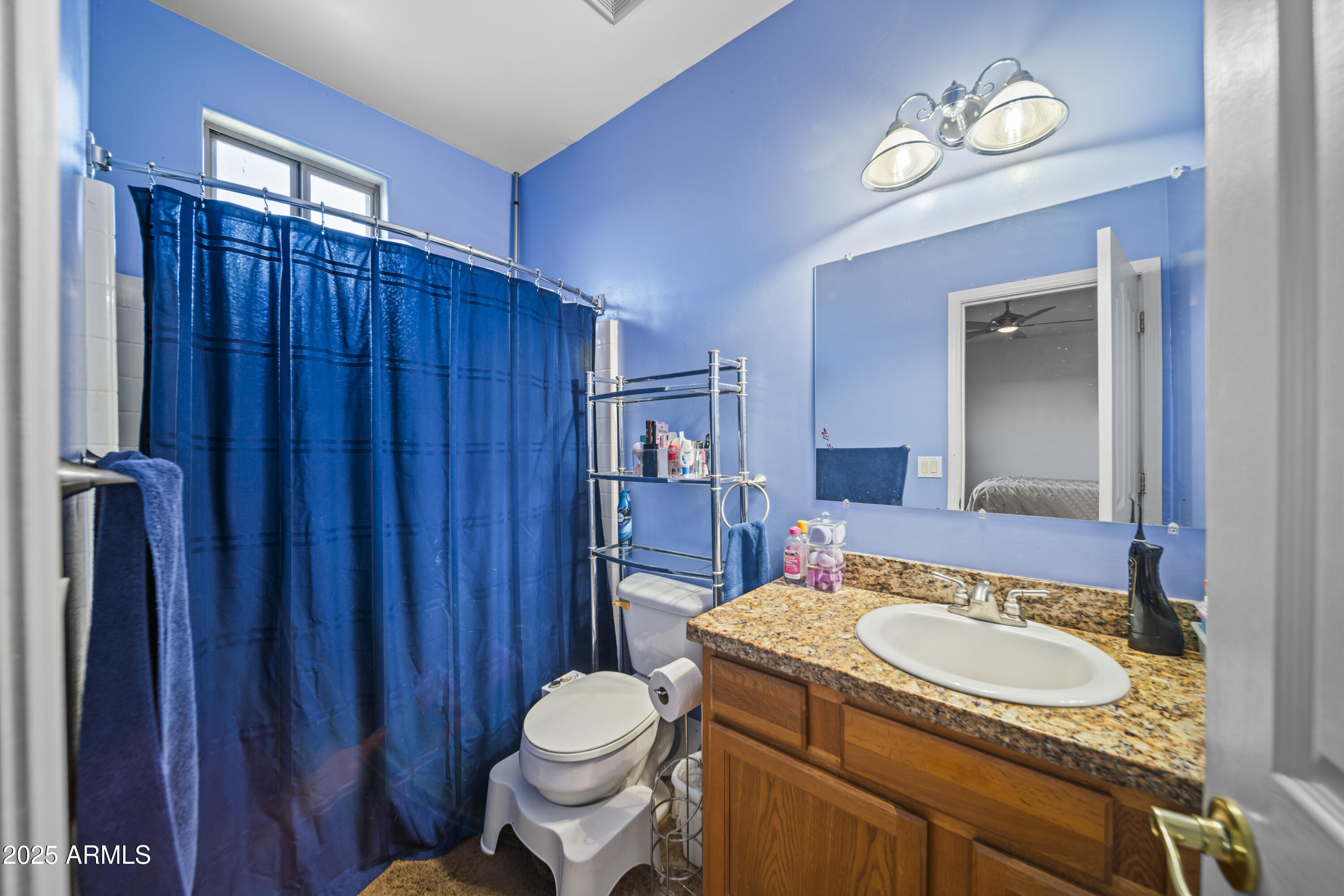 456 Guskin Road Morristown, AZ 85342 - Photo 11 of 17 a bathroom with a granite countertop sink and a mirror