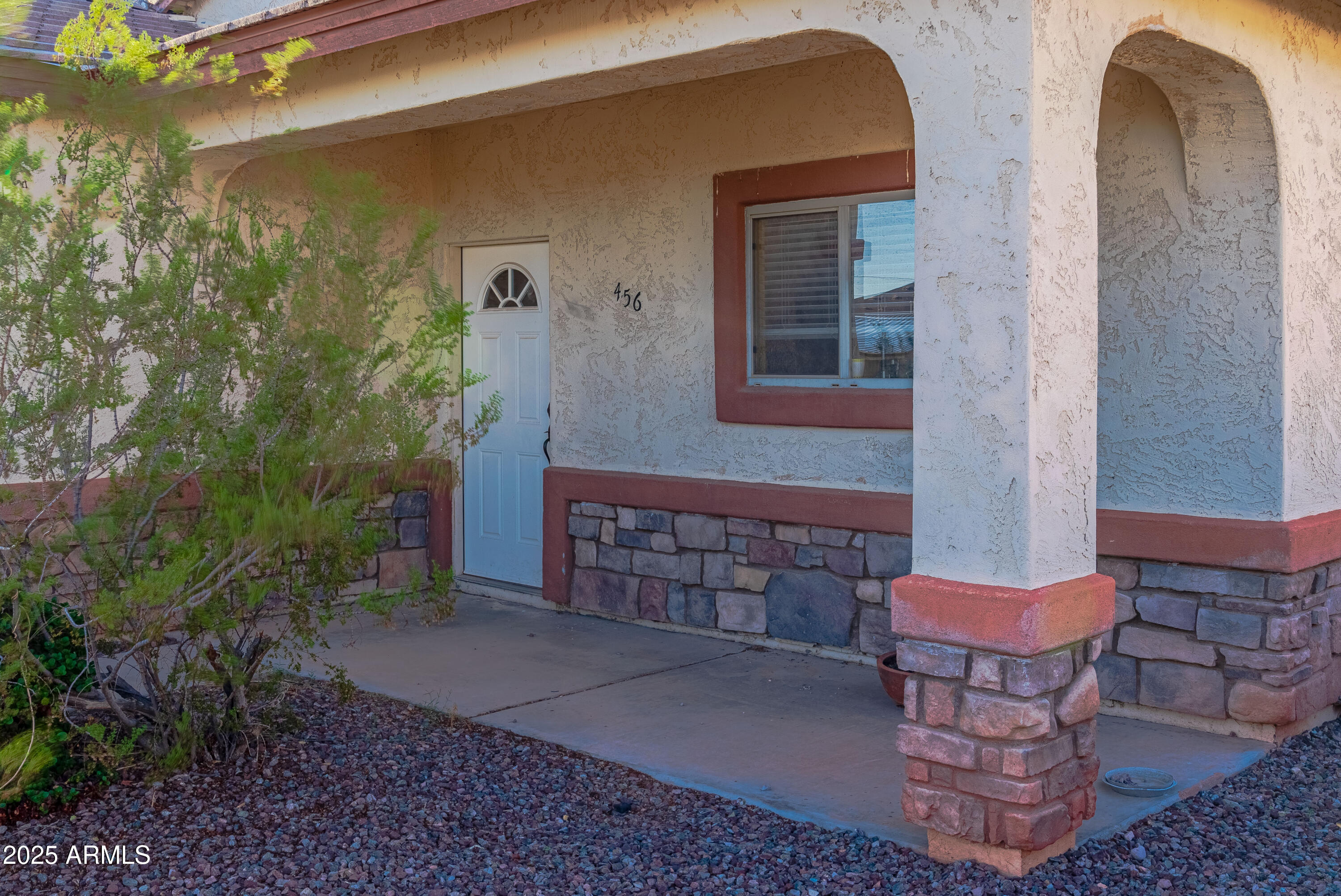 456 Guskin Road Morristown, AZ 85342 - Photo 13 of 17 a brick house with a outdoor space