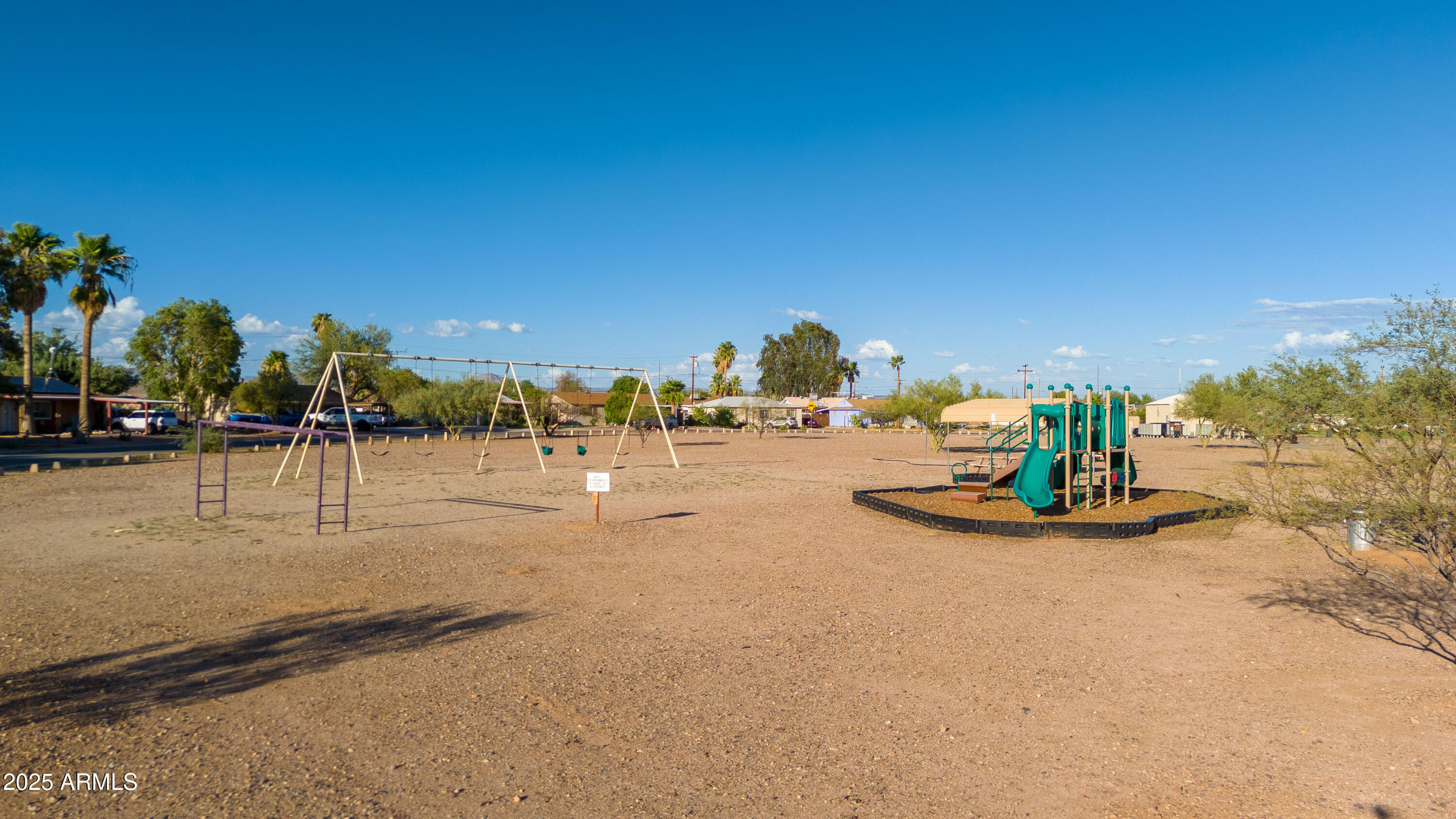 456 Guskin Road Morristown, AZ 85342 - Photo 16 of 17 a view of a swimming pool with an outdoor space and seating area