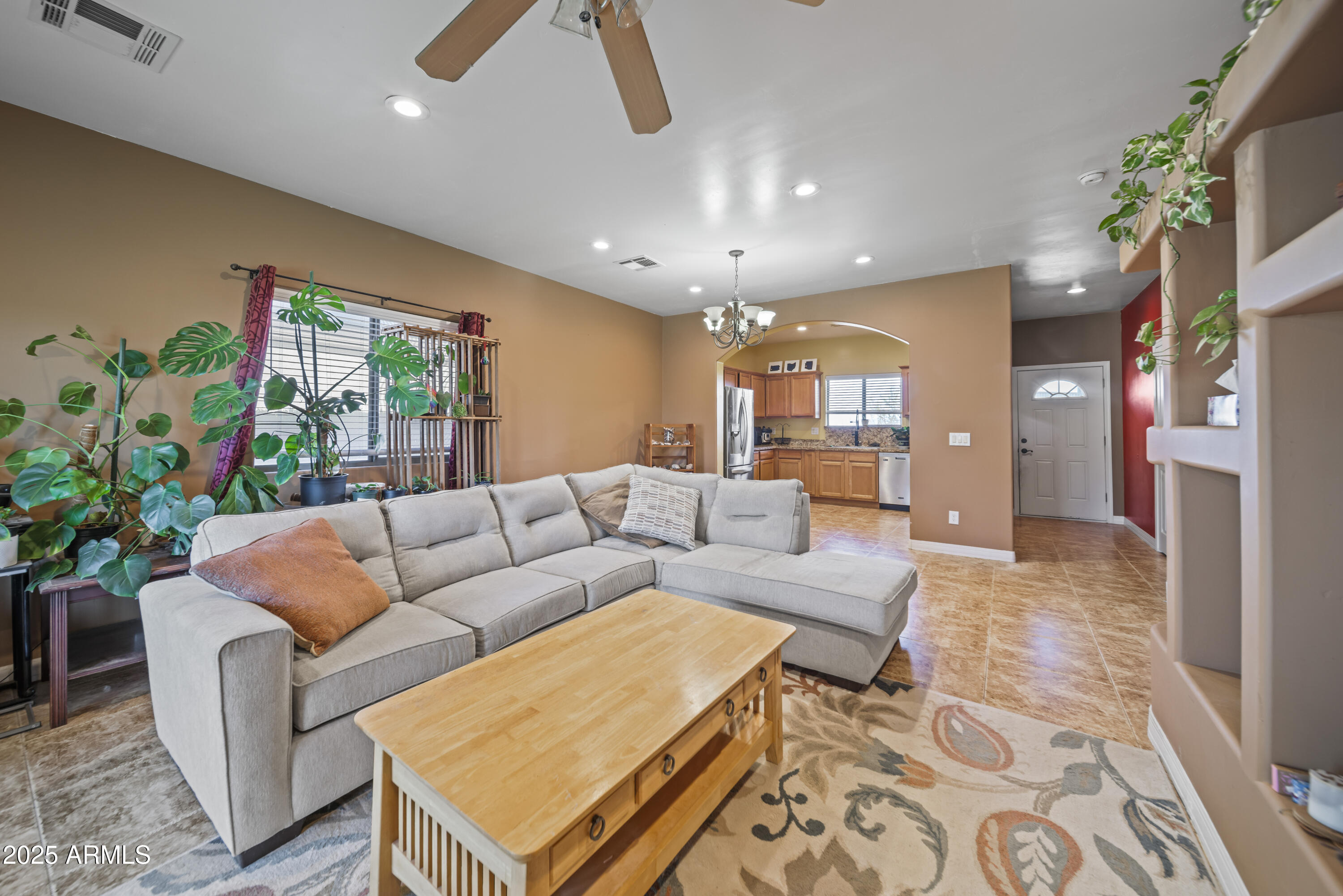 456 Guskin Road Morristown, AZ 85342 - Photo 5 of 17 a living room with furniture and a fireplace