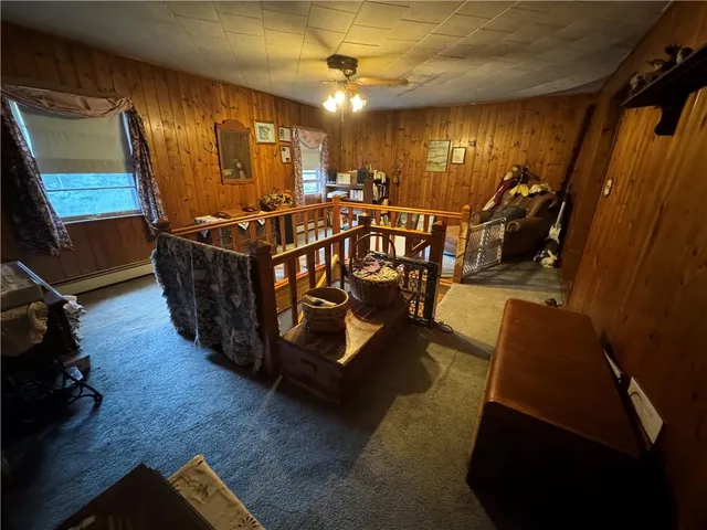 a room with lots of chairs and mirrors