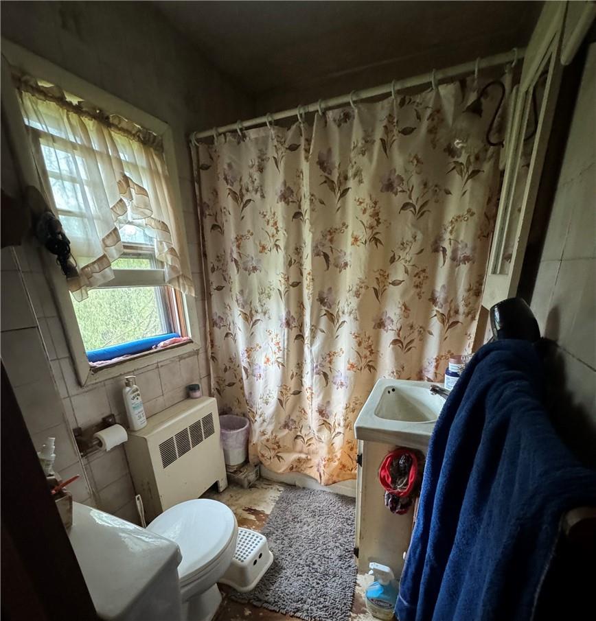 3038 State Rt 17B Cochecton, NY 12726 - Photo 21 of 21 a living room with furniture and a window