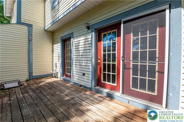 a view of a house with a large window