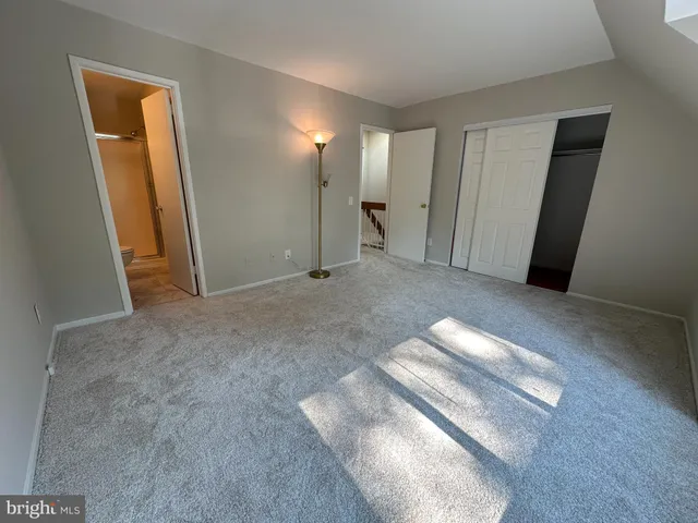 a view of empty room with windows