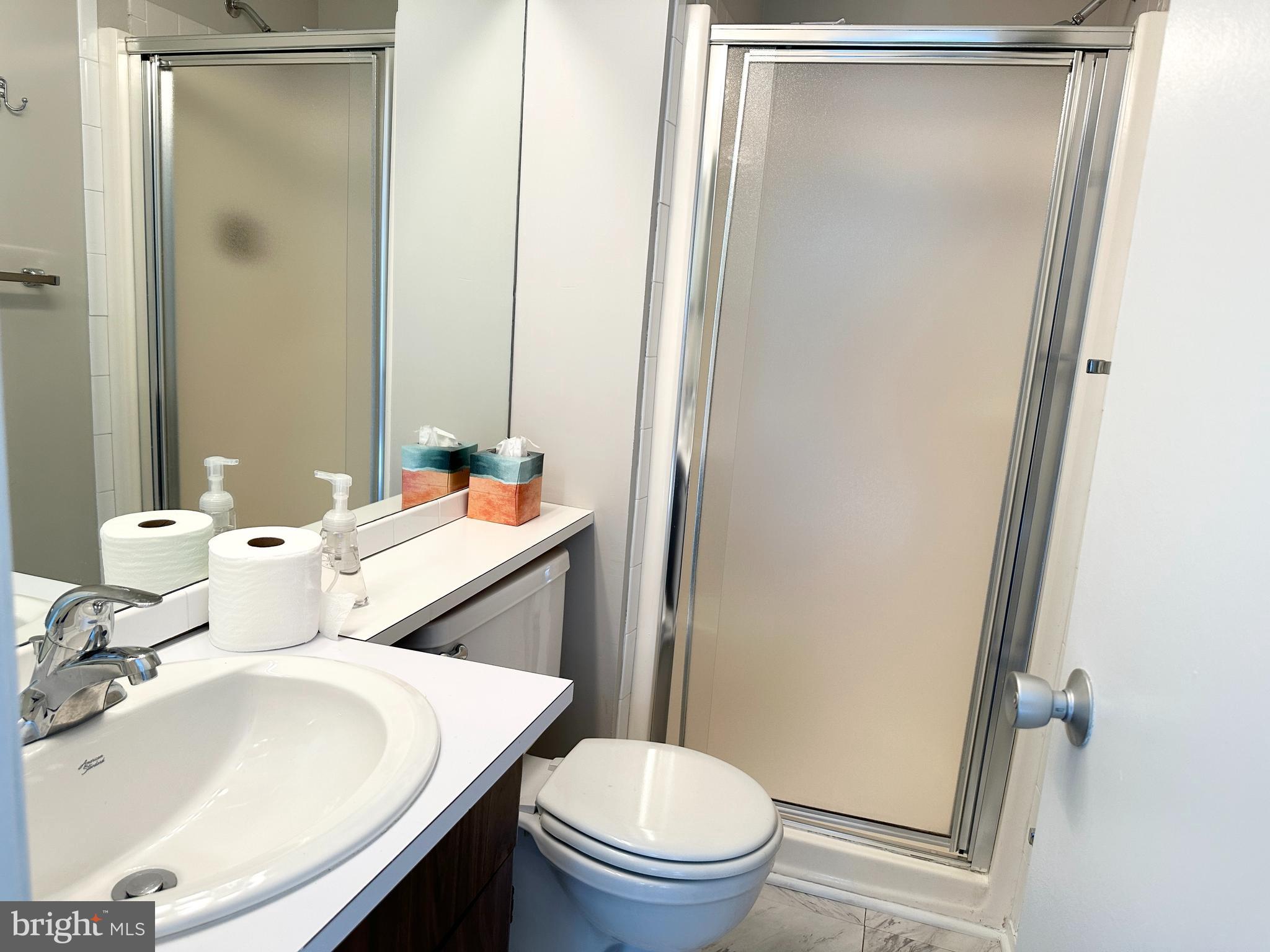 1526 Scandia Circle Reston, VA 20190 - Photo 19 of 29 a bathroom with a sink toilet and shower