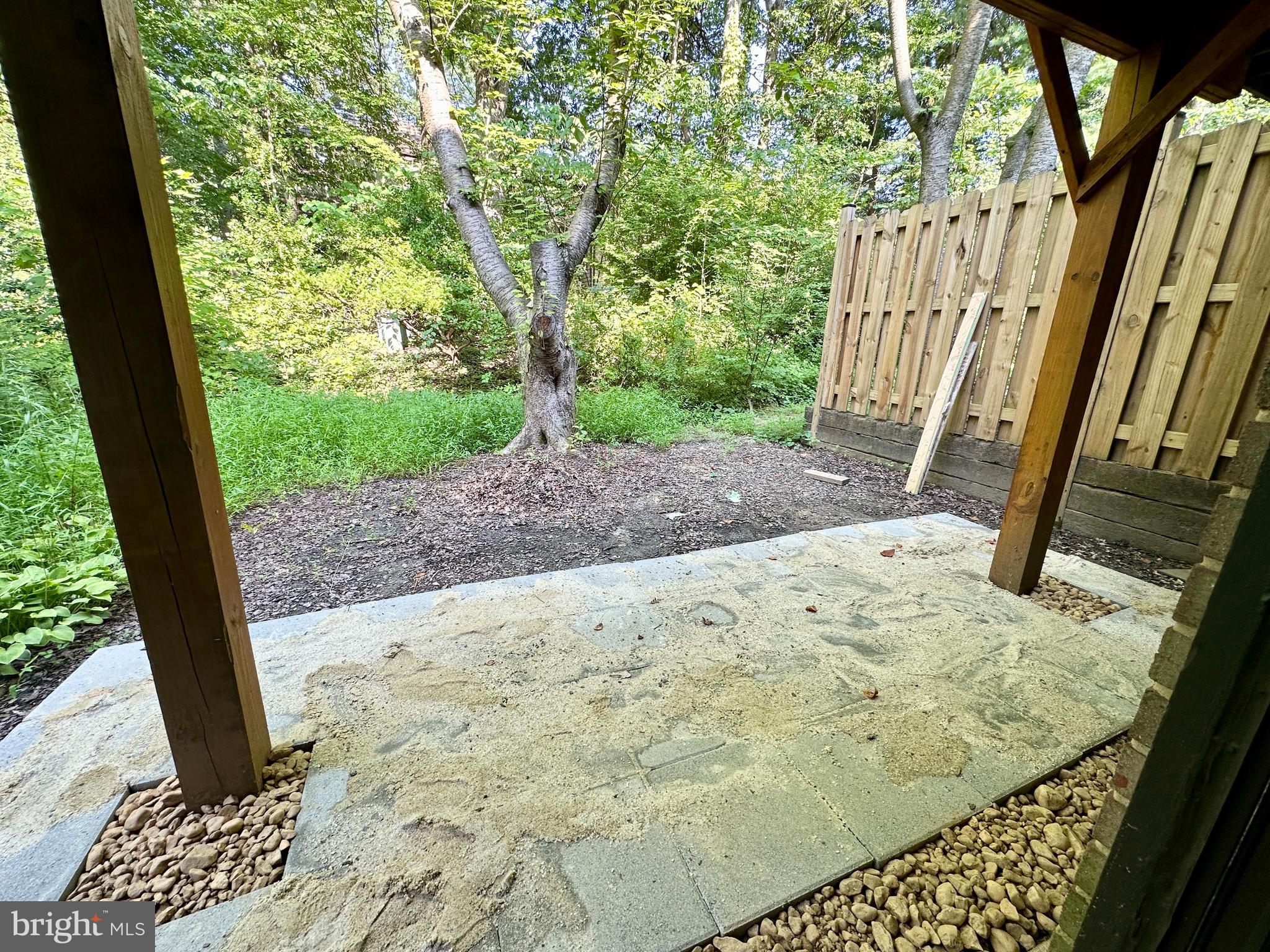1526 Scandia Circle Reston, VA 20190 - Photo 28 of 29 a view of a backyard with wooden fence and large trees