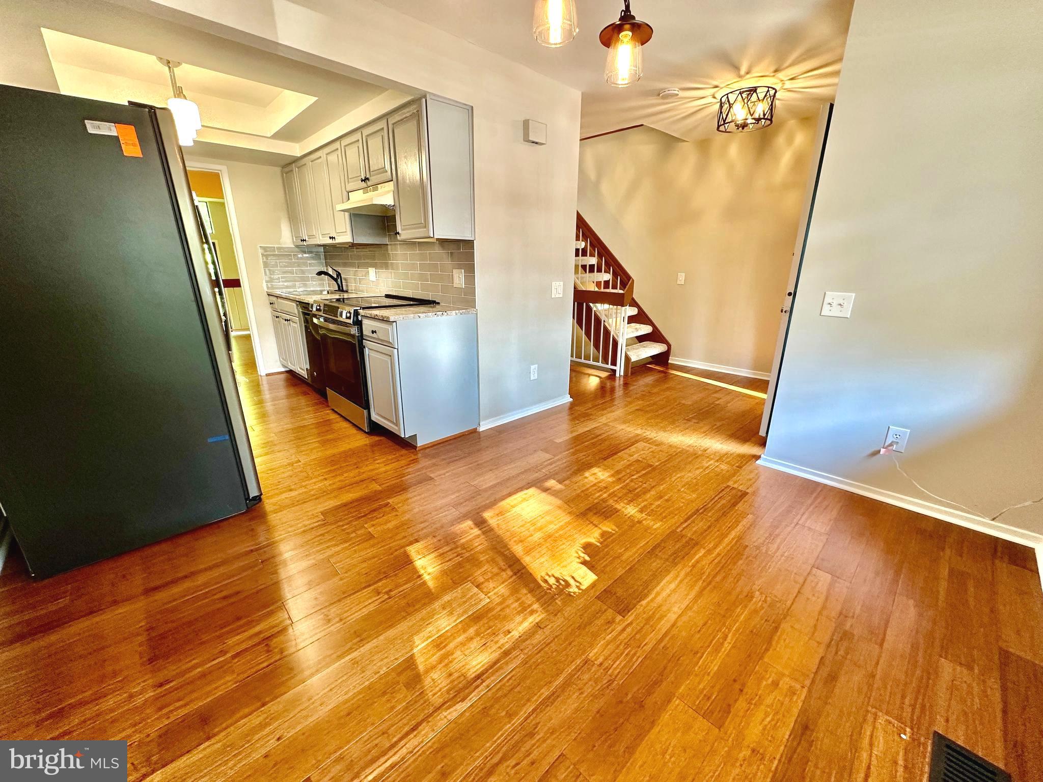1526 Scandia Circle Reston, VA 20190 - Photo 3 of 29 a view of a kitchen from a hallway