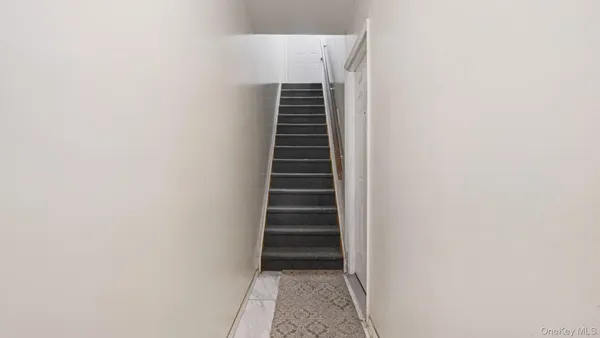 a view of hallway with stairs